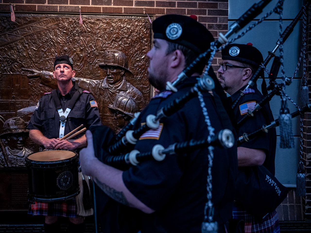 A 9/11 memorial service is held Friday, September 10, outside the New York City Fire Department's Ten House near ground zero.