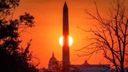 The sun rises behind the Washington Monument on the last day of summer in Washington, Monday, Sept. 21, 2020. The Autumn equinox in the northern hemisphere is Tuesday, Sept. 22 which ushers in the first day of fall. (AP Photo/J. David Ake)
