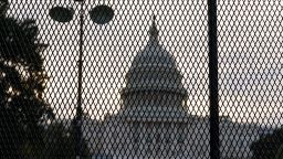 Security fencing has been reinstalled around the Capitol in Washington, Thursday, Sept. 16, 2021, ahead of a planned Sept. 18 rally by far-right supporters of former President Donald Trump who are demanding the release of rioters arrested in connection with the 6 January insurrection. (AP Photo/J. Scott Applewhite)