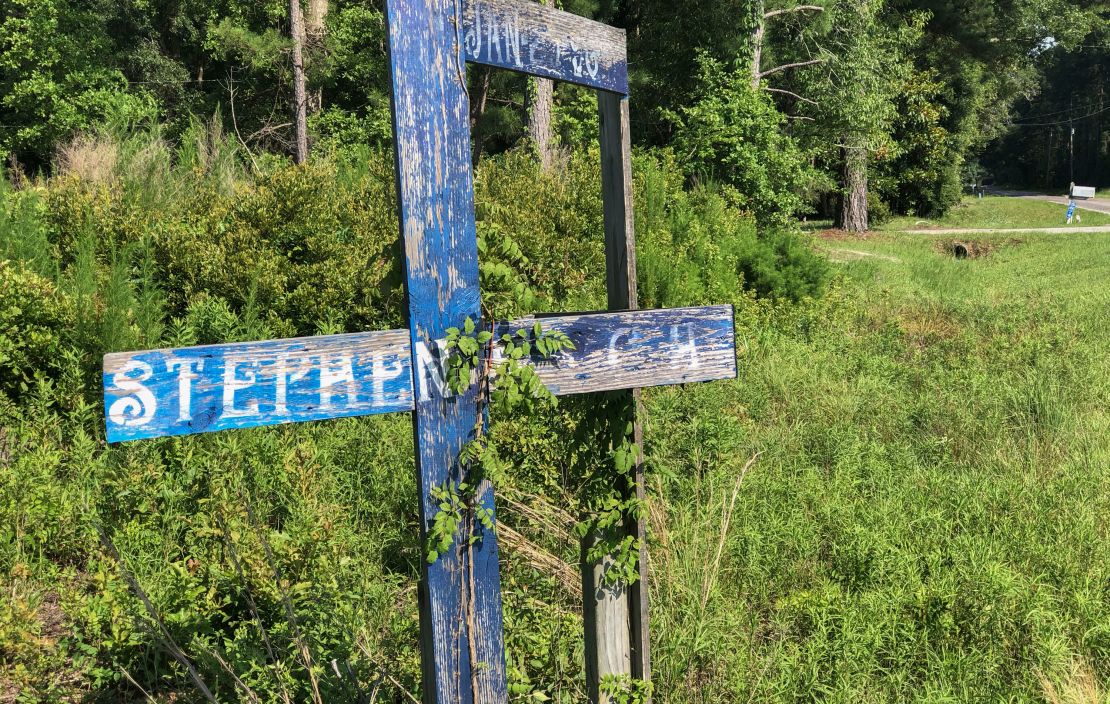 A wooden memorial erected for Stephen Nicholas Smith, 19, who was found dead on a country road in 2015. 