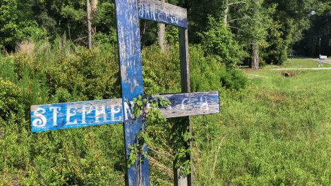 A wooden memorial erected for Stephen Nicholas Smith, 19, who was found dead on a country road in 2015. 