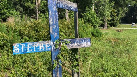 A wooden memorial erected for Stephen Nicholas Smith, 19, who was found dead on a country road in 2015.