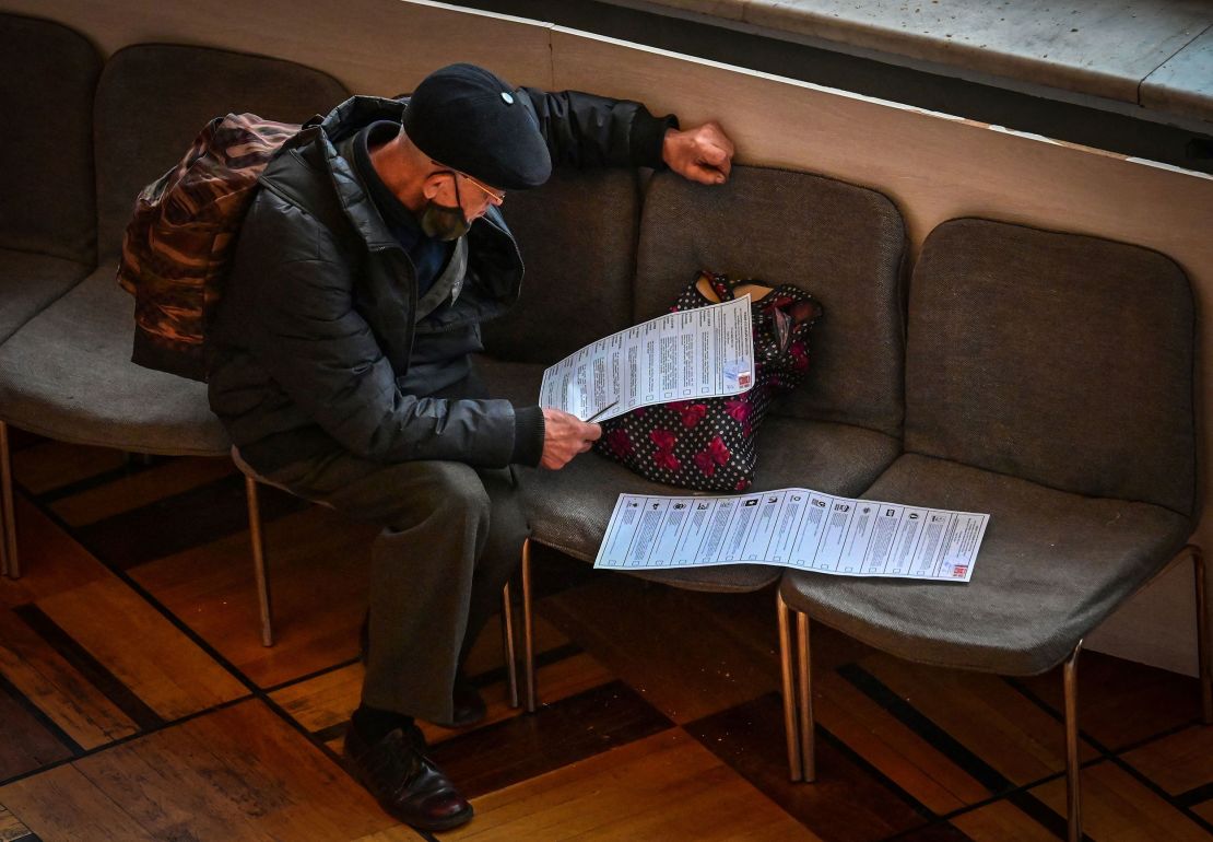 A man votes during the first day of the three-day election in Moscow on September 17.