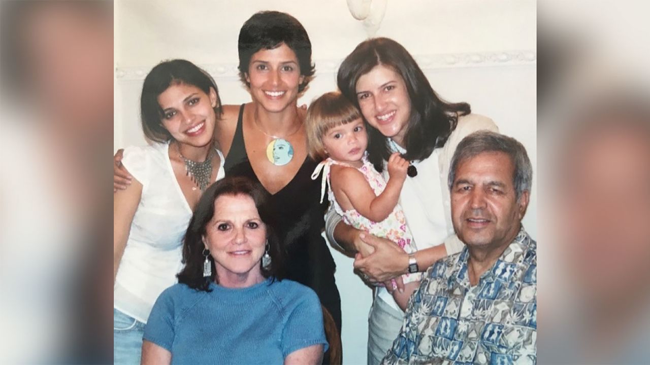 Noorullah with his late wife, Setara, bottom left, and his three daughters, Ariana, top left, Yasmine, center, Soraya, top right, and grandaughter, Siena.