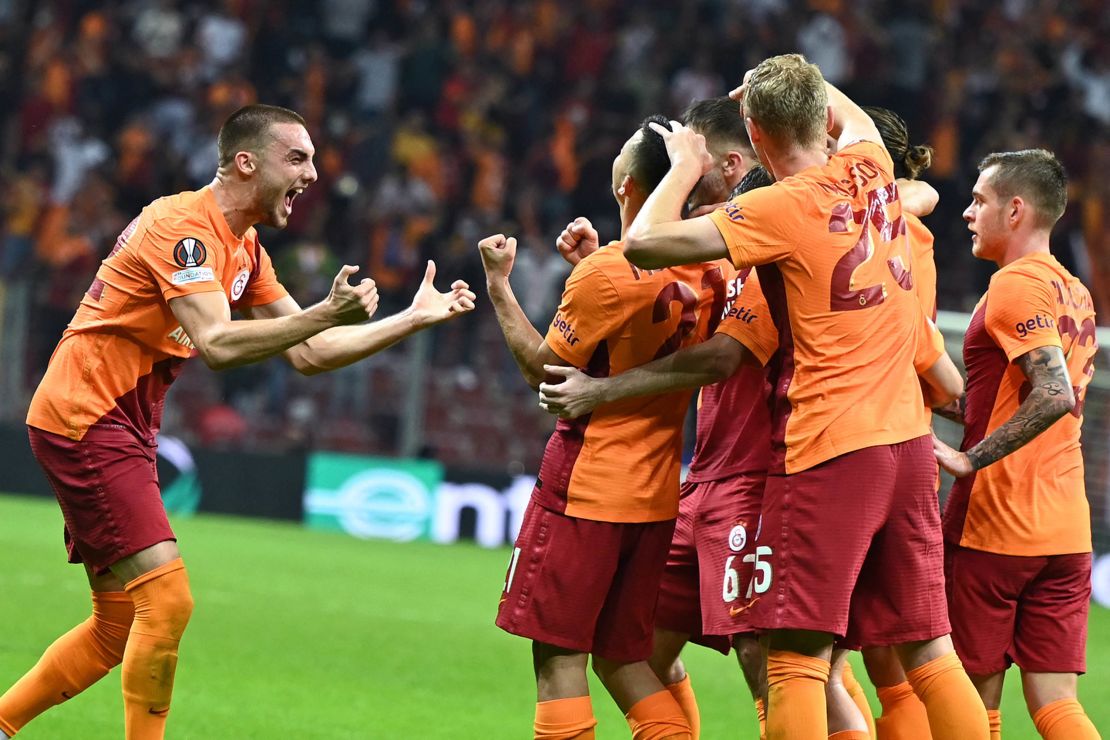 Galatasaray's players celebrate taking the lead.