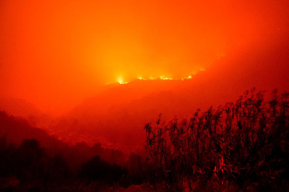 Flames from the KNP Complex Fire burn along a hillside in the Sequoia National Park on September 14. 