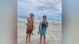 Doyle Nielsen, left, and his brother Logan were surfing on September 9 at Ponce Inlet, Florida, when a shark bit Doyle's arm.