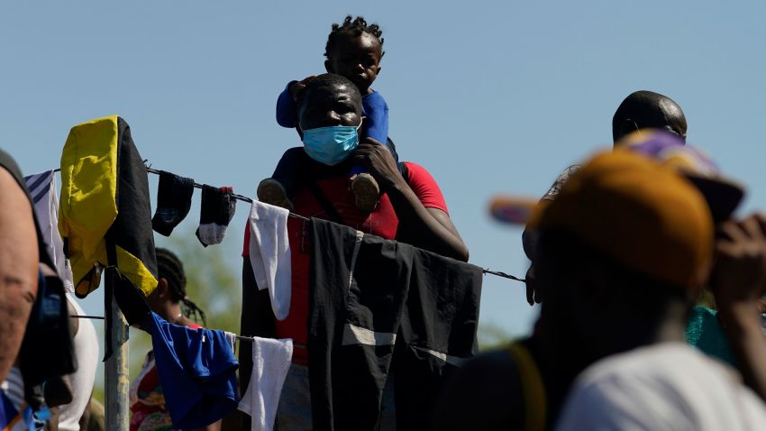 Migrants in a make-shift camp after crossing the Rio Grande to the United States from Mexico, Friday, Sept. 17, 2021, in Del Rio, Texas. Thousands of Haitian migrants have assembled under and around a bridge in Del Rio presenting the Biden administration with a fresh and immediate challenge as it tries to manage large numbers of asylum-seekers who have been reaching U.S. soil. (AP Photo/Eric Gay)