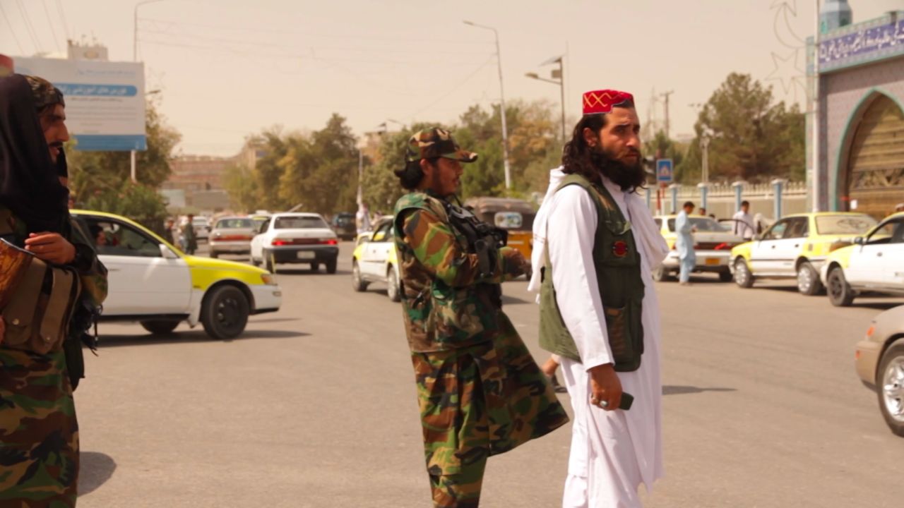 Taliban patrol the streets of Mazar-i-Sharif.