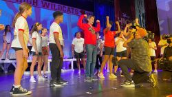 John Berman on stage with the Riverdale Children's Theatre.