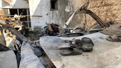 A pair of sandals sit on the car destroyed in a US airstrike in Kabul on August 29 in which 10 civilians were killed.
