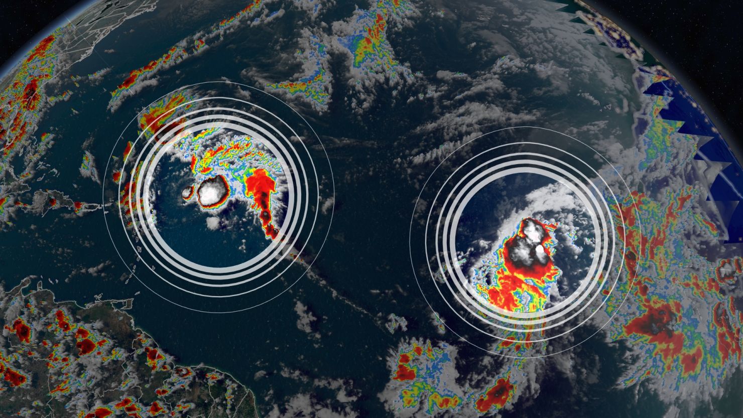 Tropical Storms Peter (left) and Rose (right) on satellite imagery Sunday afternoon.