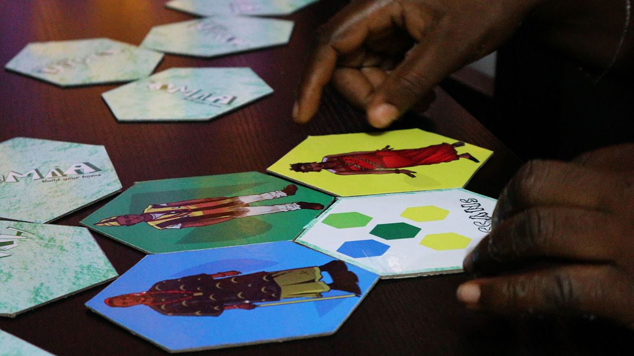 Created in 2017, "Homia" is a memory and recognition game card game where players race to build their Nigerian home to win.