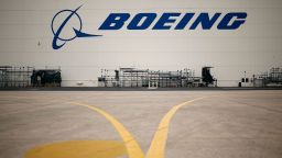 Boeing Co. signage is displayed outside a hangar at the Boeing Global Services and Support facility in San Antonio, Texas, on January 20, 2016.