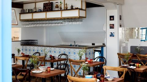 The restaurant has a homely feel, with photos on the wall of Alarnab and his family.
