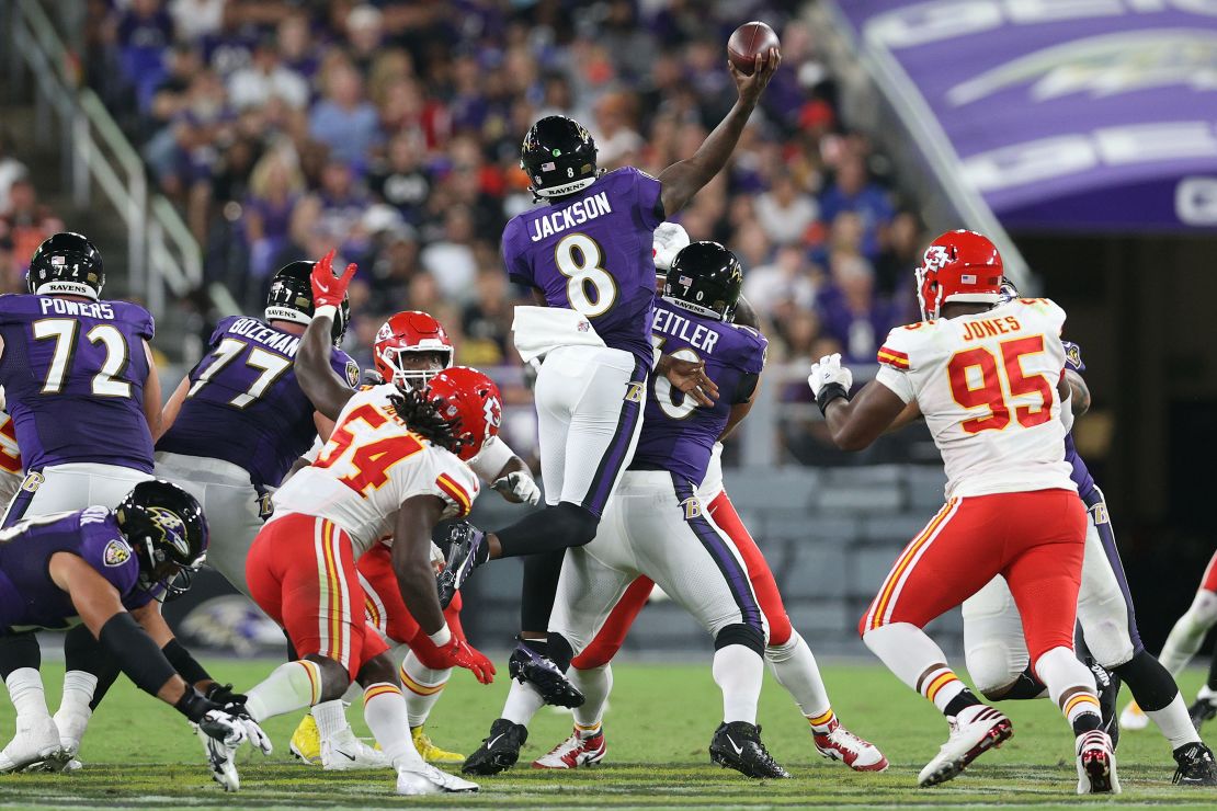 Jackson throws a touchdown while midair against the Chiefs.