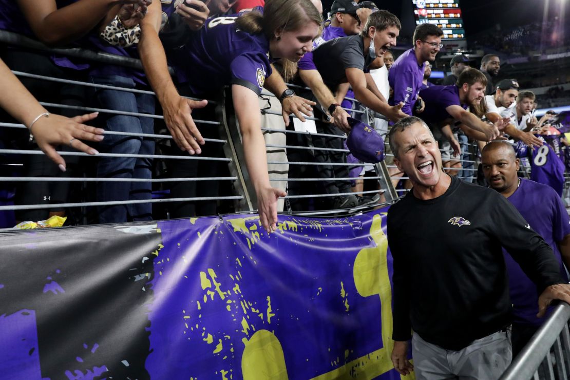 Harbaugh celebrates after defeating the Kansas City Chiefs.