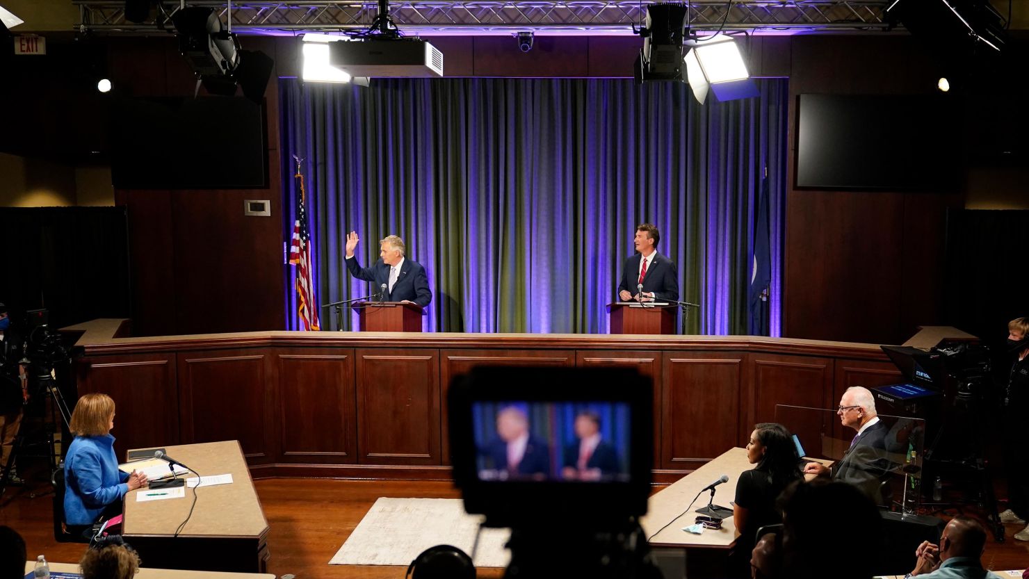 Democratic gubernatorial candidate former Gov. Terry McAuliffe, left, and Republican challenger Glenn Youngkin prepare for a debate at the Appalachian School of Law in Grundy, Virginia, Thursday, September 16, 2021. 