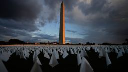 With the Washington Monument in the background, white flags are displays as part of artist Suzanne Brennan Firstenberg's temporary art installation, "In America: Remember," in remembrance of Americans who have died of COVID-19, on the National Mall in Washington, Friday, Sept. 17, 2021. The installation consists of more than 630,000 flags. (AP Photo/Brynn Anderson)