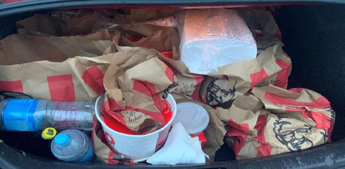The men, who were traveling from Hamilton to Auckland, had a large amount of KFC in their trunk and NZ$100,000 ($70,000) in cash. 
