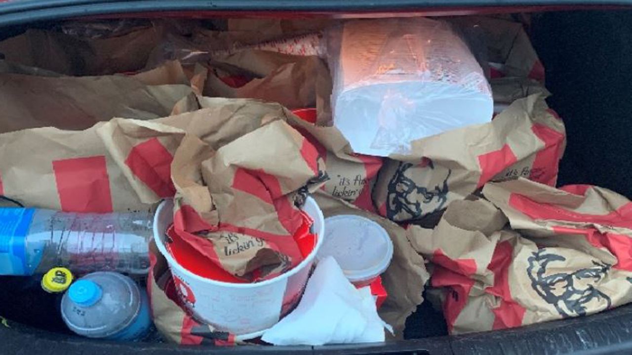 The men, who were traveling from Hamilton to Auckland, had a large amount of KFC in their trunk and NZ$100,000 ($70,000) in cash. 
