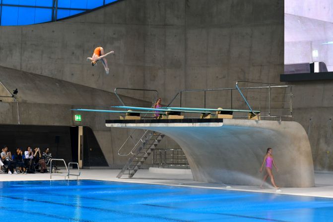 Rejina Pyo staged her show at the London Aquatics Centre, with a dramatic diving introduction by Team GB's Emily Martin, Josie Zilling and Robyn Birch.