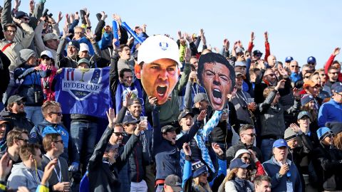 European fans display giant pictures of Rory McIlroy and Sergio Garcia during the morning fourball matches of the 2018 Ryder Cup at Le Golf National.