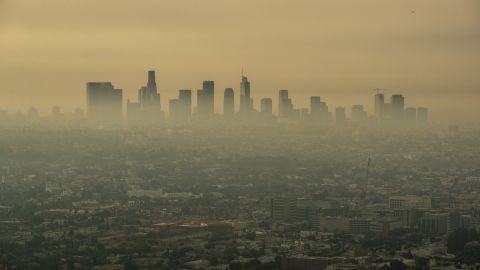 Smoke from Southern California wildfires drifts through the Los Angeles Basin, obscuring downtown skyscrapers in a view from a closed Griffith Observatory in Los Angeles on Sept. 17, 2020. 