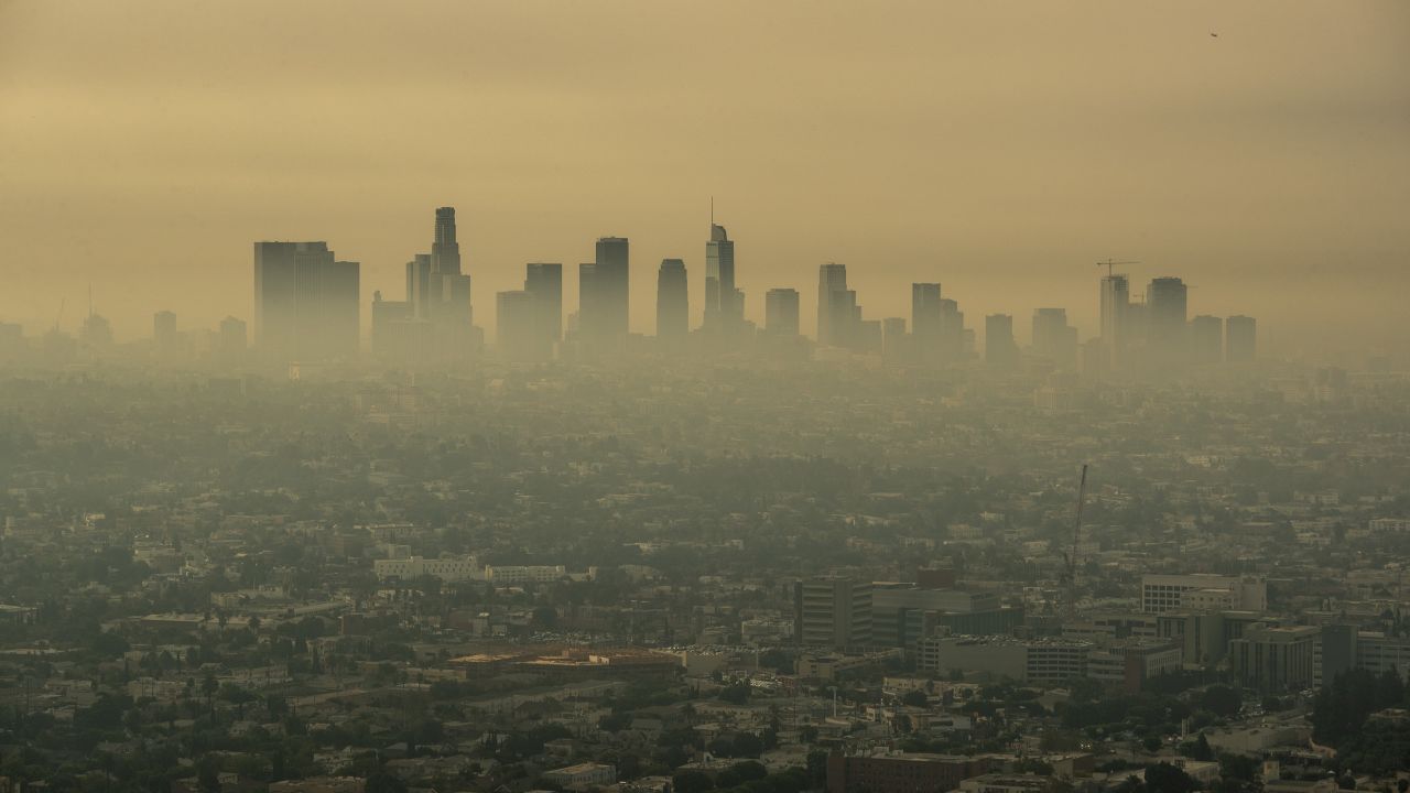 Smoke from Southern California wildfires drifts through the Los Angeles Basin, obscuring downtown skyscrapers in a view from a closed Griffith Observatory in Los Angeles on Sept. 17, 2020. 