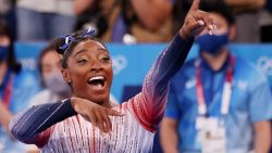 TOKYO, JAPAN - AUGUST 03: Simone Biles of Team United States reacts during the Women's Balance Beam Final on day eleven of the Tokyo 2020 Olympic Games at Ariake Gymnastics Centre on August 03, 2021 in Tokyo, Japan. (Photo by Laurence Griffiths/Getty Images)
