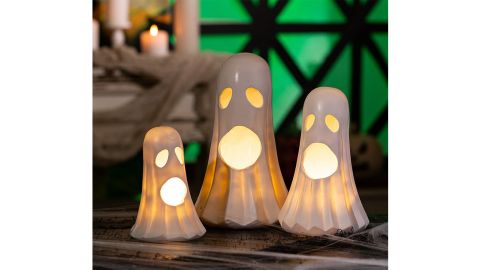 Table decoration of illuminated Halloween ghosts