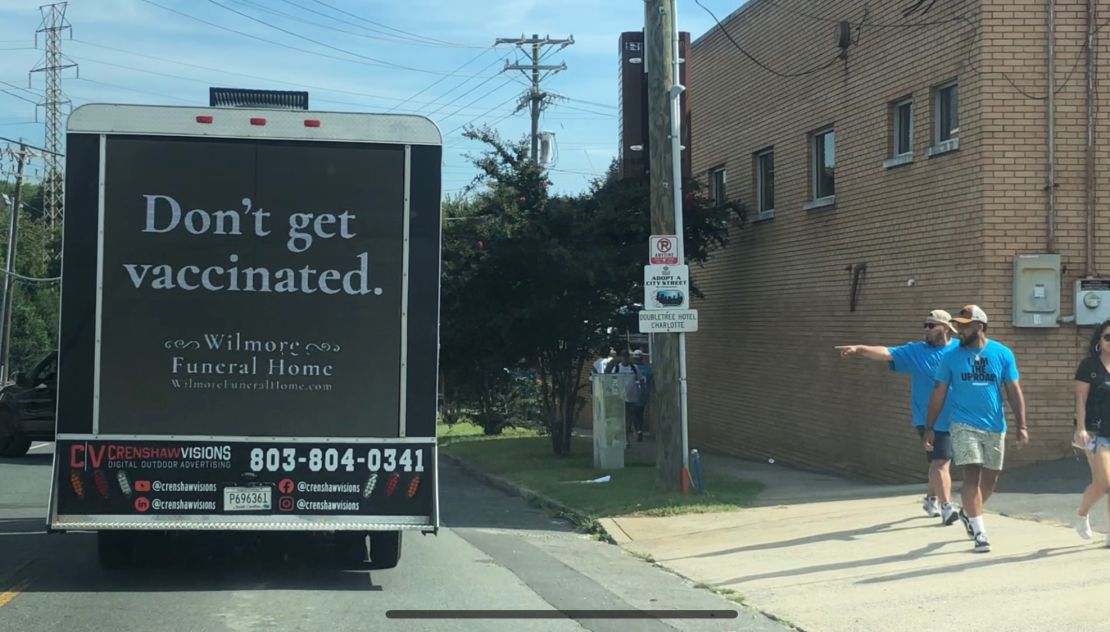 An advertising agency hired a truck to drive around Charlotte with a hidden message about vaccination.