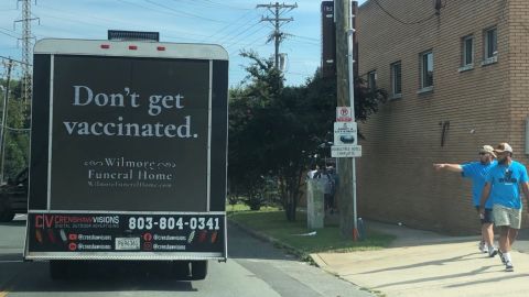 An advertising agency hired a truck to drive around Charlotte with a hidden message about vaccination.
