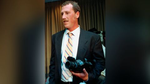 Holliday holds the videocamera he used to capture the Rodney King beating after a 1991 news conference.