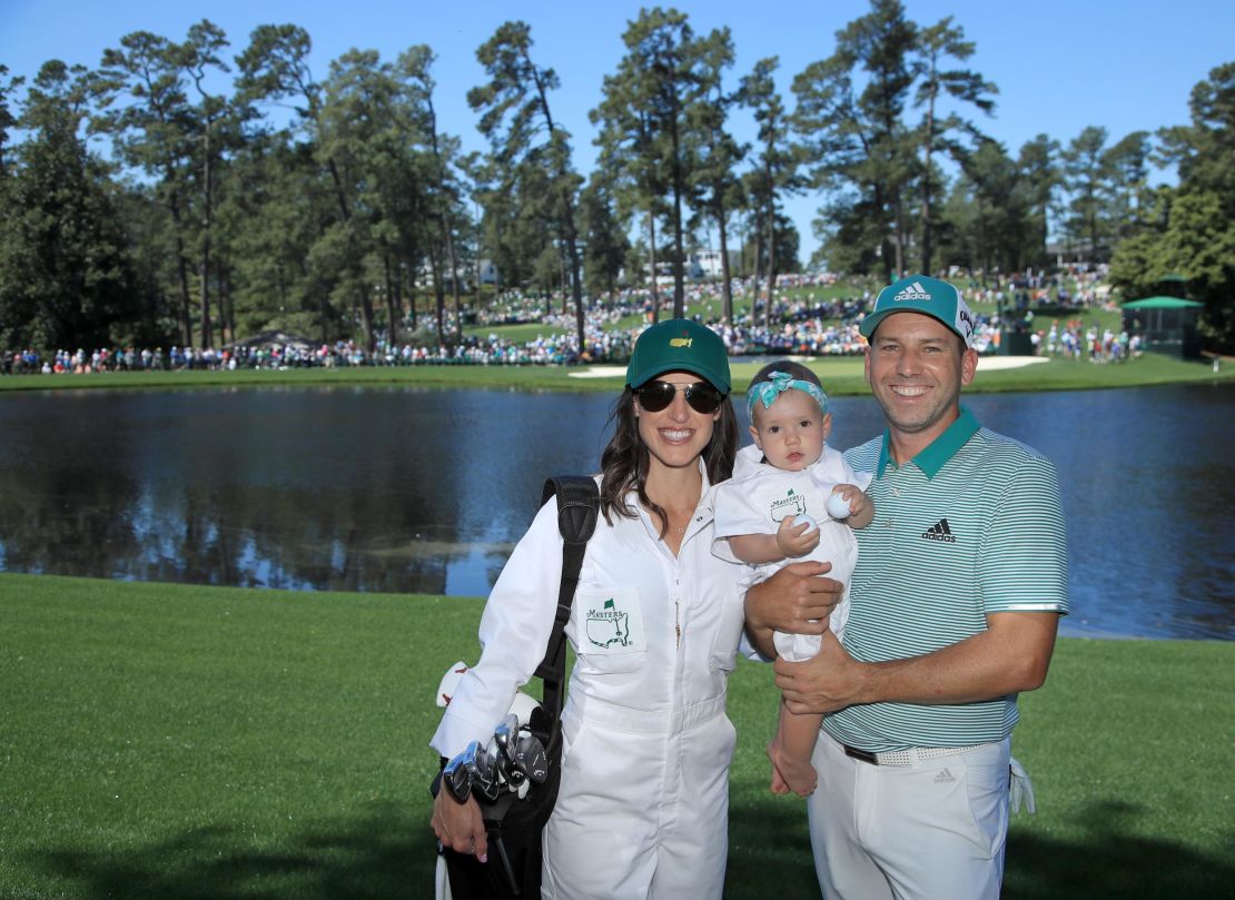 Sergio Garcia poses with Angela and daughter Azalea during the Par 3 Contest prior to the Masters in 2019.