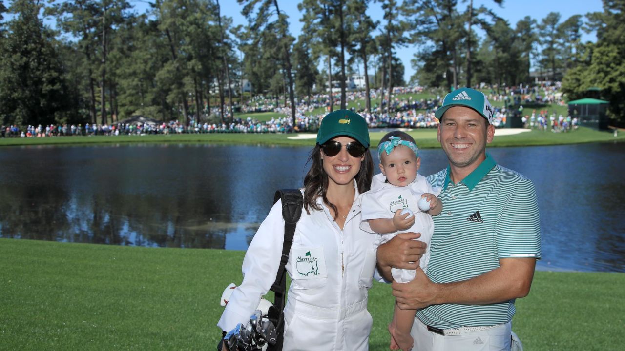 Sergio Garcia poses with Angela and daughter Azalea during the Par 3 Contest prior to the Masters in 2019.