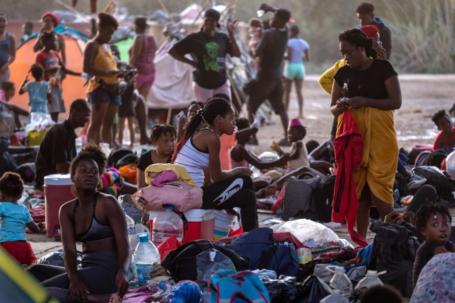 Migrants camp under the Del Rio International Bridge on Tuesday, September 21.