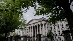 The U.S. Treasury Department building in Washington, D.C., U.S., on Saturday, June 26, 2021. The Federal Reserve might consider an interest-rate hike from near zero as soon as late 2022 as the labor market reaches full employment and inflation is at the central bank's goal. 