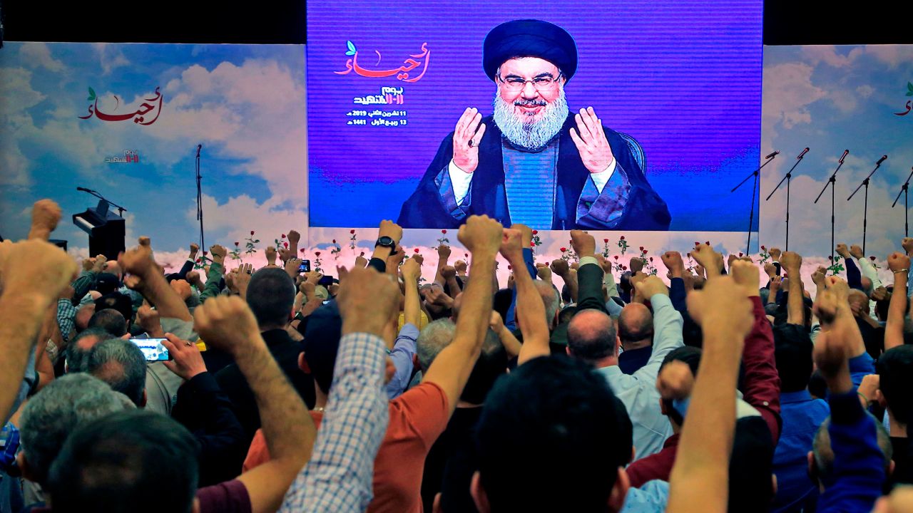 Hezbollah leader Hassan Nasrallah is cheered by supporters during a speech in November 2019.  