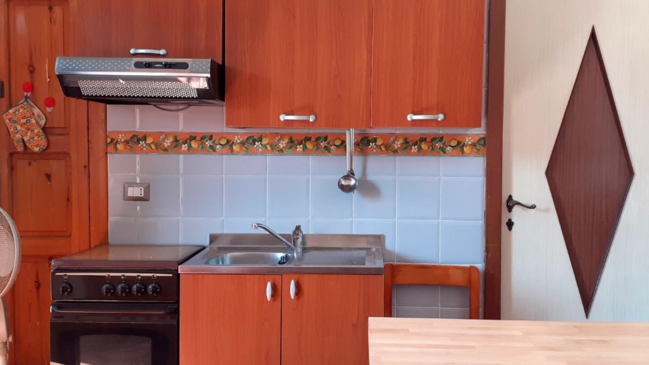 Morandi's new home comes with a fitted ktichen -- a luxury compared to his old hut.