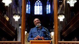 Artist Kerry James Marshall speaks at a news conference after being selected to design a replacement of former Confederate-themed stained glass windows that were taken down in 2017 at the National Cathedral in Washington, Thursday, Sept. 23, 2021. The Cathedral has also commissioned Pulitzer-nominated poet Dr. Elizabeth Alexander to pen a poem that will be inscribed in the stone beneath the new windows.