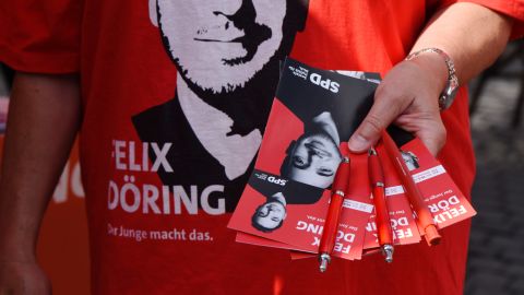 Pamphlets are given out by the Social Democrats (SPD) at the main square in Alsfeld.