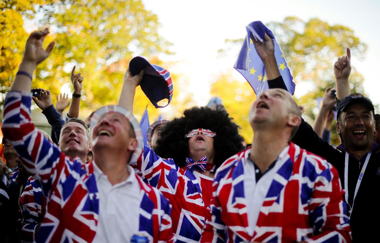 Fans cheer as champagne is dropped on them by the European team after their victory at the 39th Ryder Cup in Medinah, Illinois, in 2012.