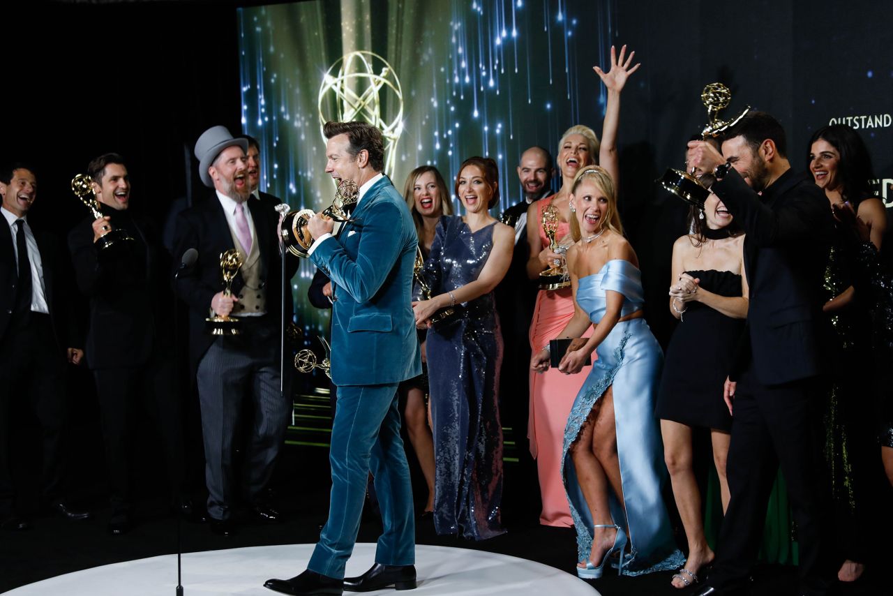 Cast and crew from "Ted Lasso" celebrate in the press room during the Emmy Awards in Los Angeles on Sunday, September 19. They won for "Outstanding Comedy Series." Some of the show's <a href="http://www.cnn.com/2021/09/19/entertainment/emmy-winners-2021-full-list/index.html" target="_blank">other awards included:</a> Jason Sudeikis for "Outstanding Lead Actor In A Comedy Series;" Brett Goldstein for "Outstanding Supporting Actor In A Comedy Series;" and Hannah Waddingham for "Outstanding Supporting Actress In A Comedy Series."
