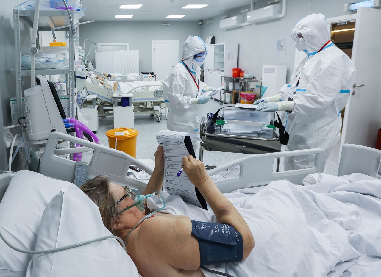 A patient at a Covid-19 reserve hospital at the VDNKh Exhibition Centre in Moscow votes in Russia's parliamentary election. <a href="https://www.cnn.com/2021/09/19/europe/russia-election-results-intl/index.html" target="_blank">Voting concluded on Sunday, September 19, </a>as people across the country cast votes for members of the State Duma -- the lower house of the Russian Parliament -- and several regional and municipal heads. Russia's ruling party is on track to secure a majority, amid allegations of voter fraud and interference.