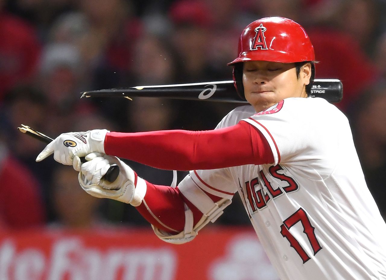 Los Angeles Angels designated hitter Shohei Ohtani breaks his bat in the seventh inning against the Oakland Athletics at Angel Stadium in Anaheim, California, on Saturday, September 18.