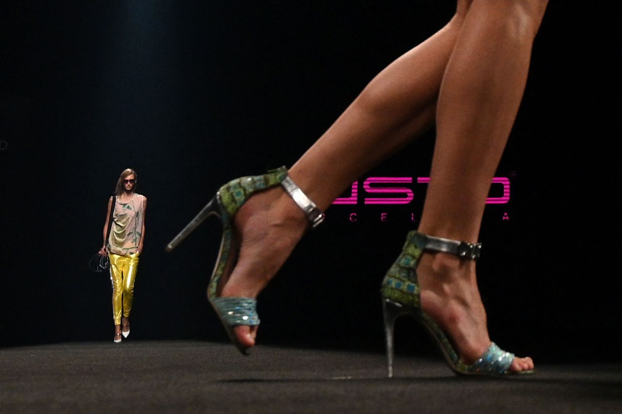 Models walk in the Custo Barcelona show during fashion week in Madrid on Saturday, September 18.