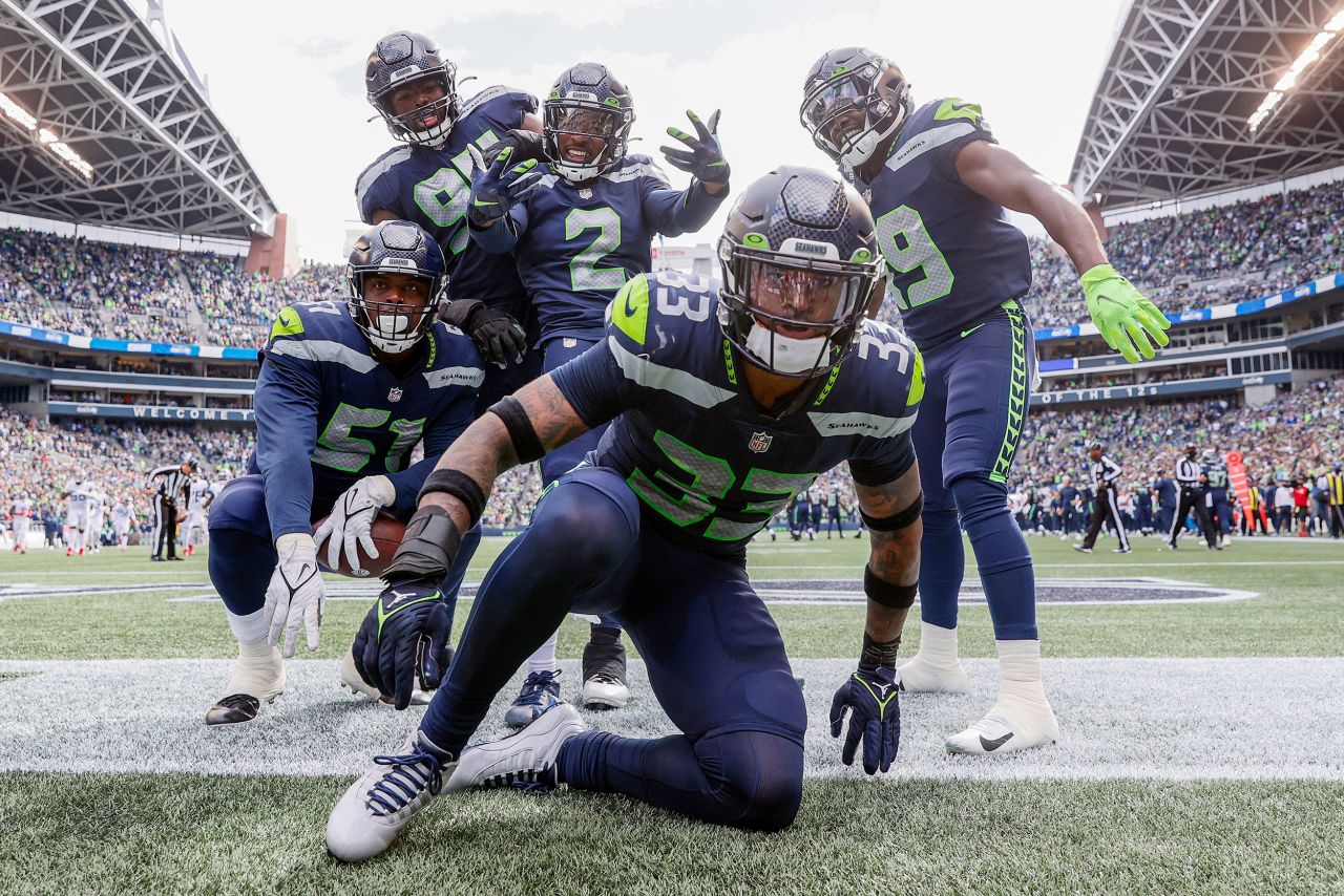 Jamal Adams of the Seattle Seahawks and his teammates celebrate their turnover against the Tennessee Titans during the second quarter of a National Football League game at Lumen Field in Seattle on Sunday, September 19.