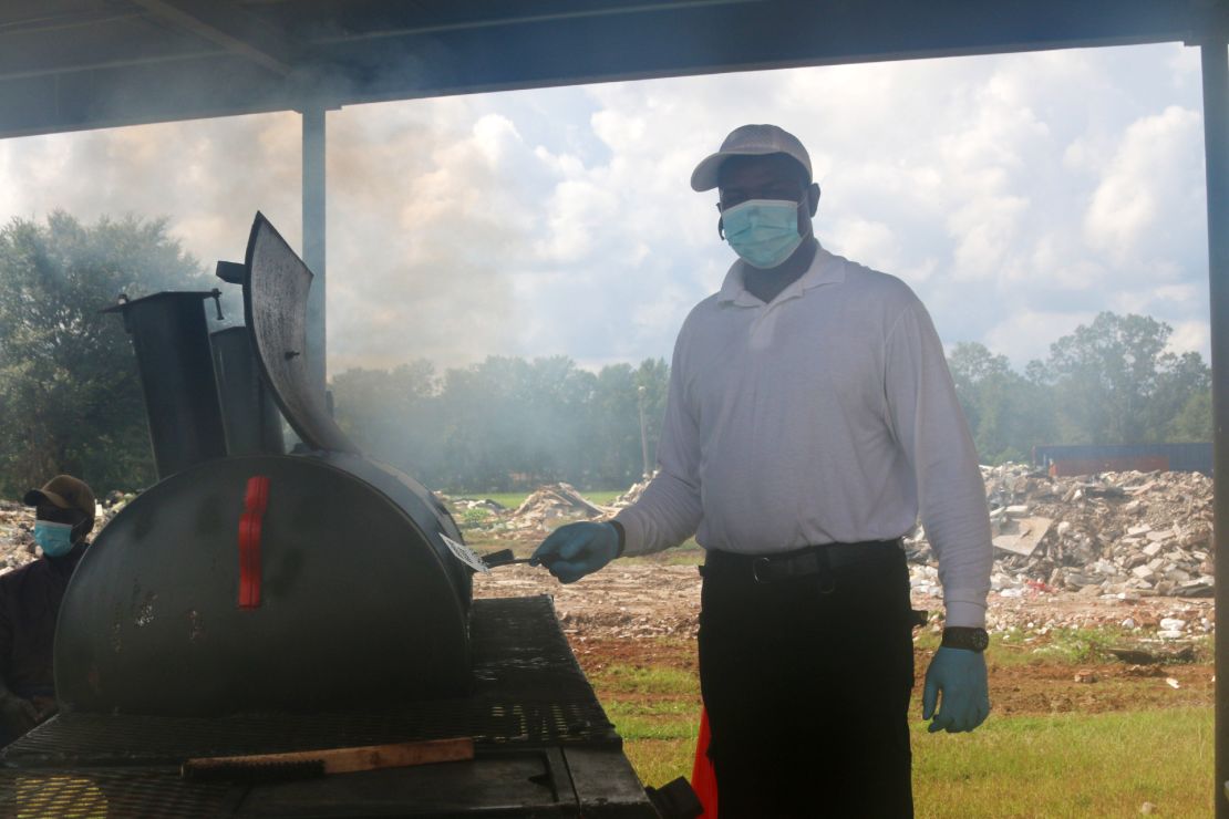 The school district's bus director volunteered to make burgers for kids who got vaccinated.