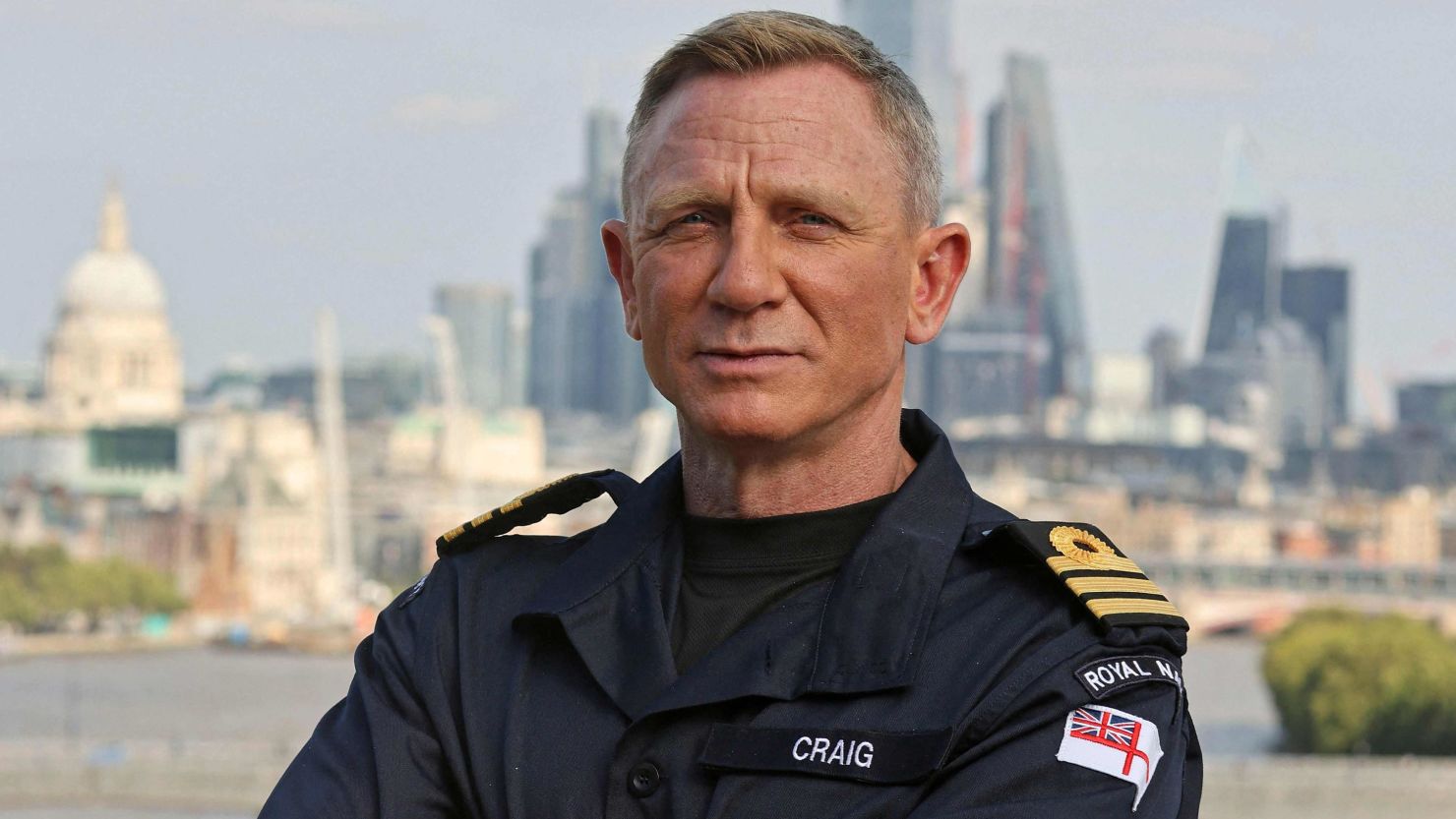 The British Royal Navy shows off its newest honorary officer, "James Bond" star Daniel Craig, at a ceremony in London this week.